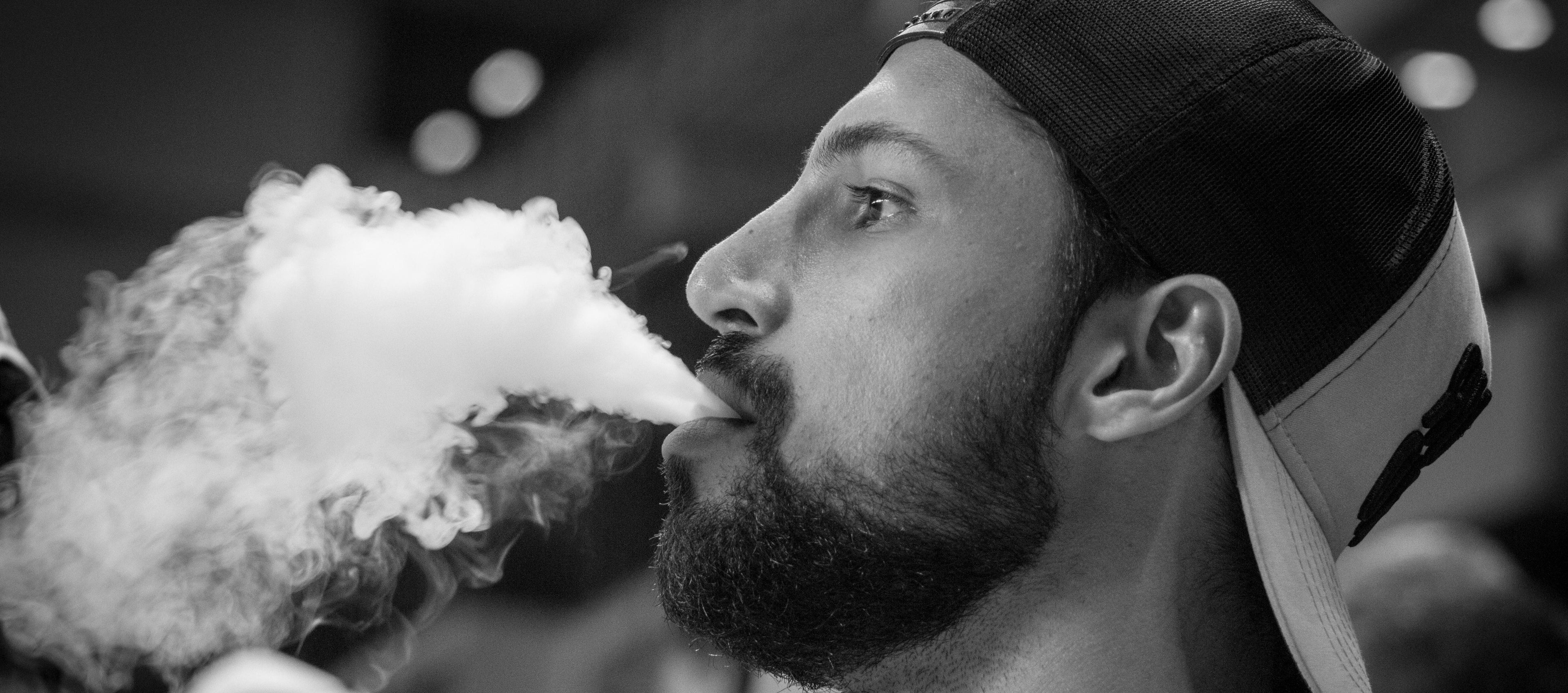 Man smoking vape bought from vape and puff online website in India